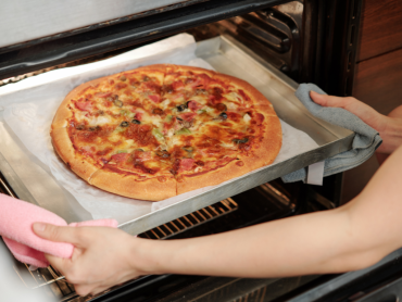How To Take Pizza Out Of Oven?