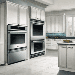 A bosch oven and a thermador oven side by side